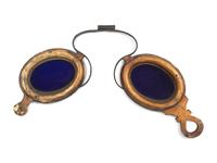 A Gilt Metal and Glass Optician's Trade Sign
