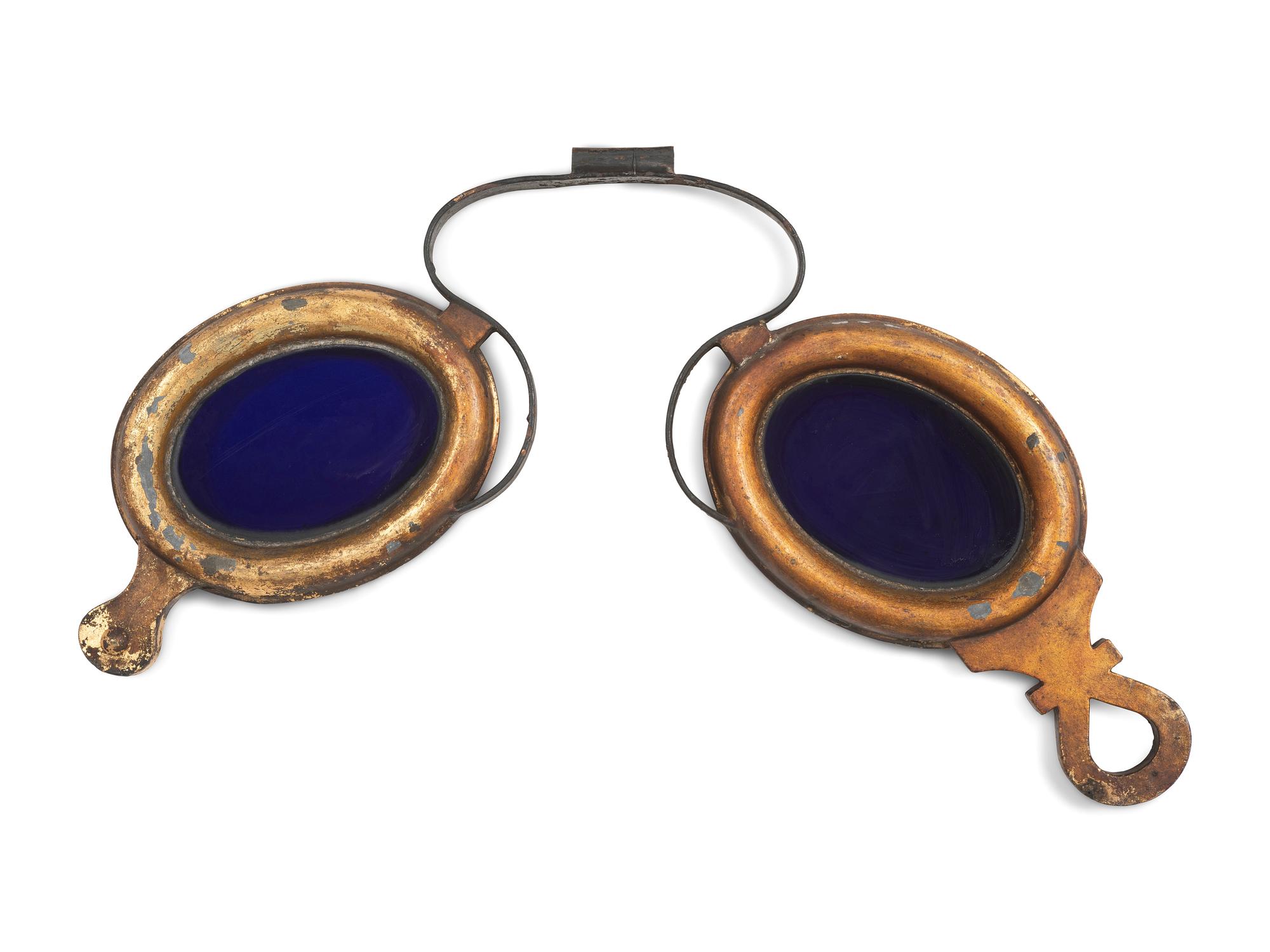 A Gilt Metal and Glass Optician's Trade Sign