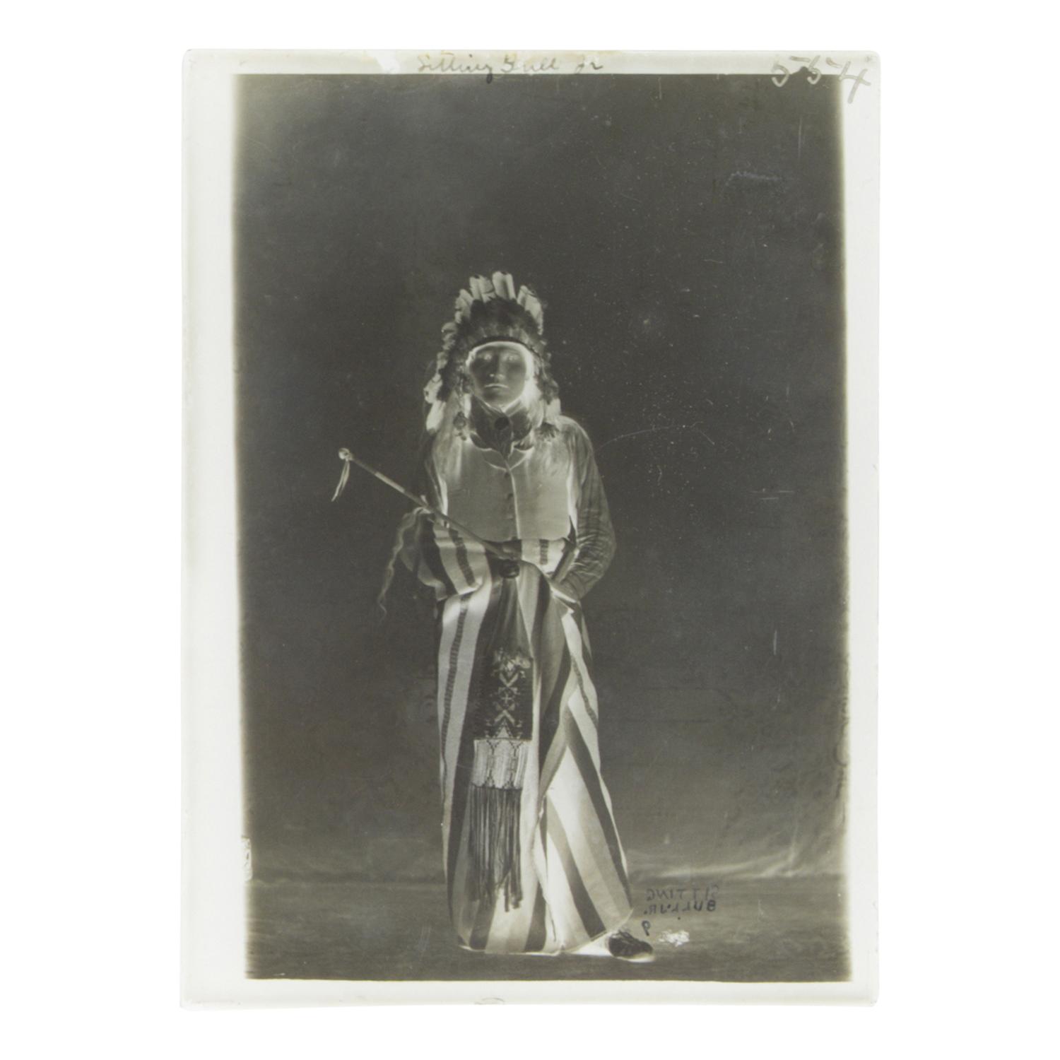 [Western Americana]. A group of 17 magic lantern slides and glass negatives, including towns, Native American subjects, and other personalities.