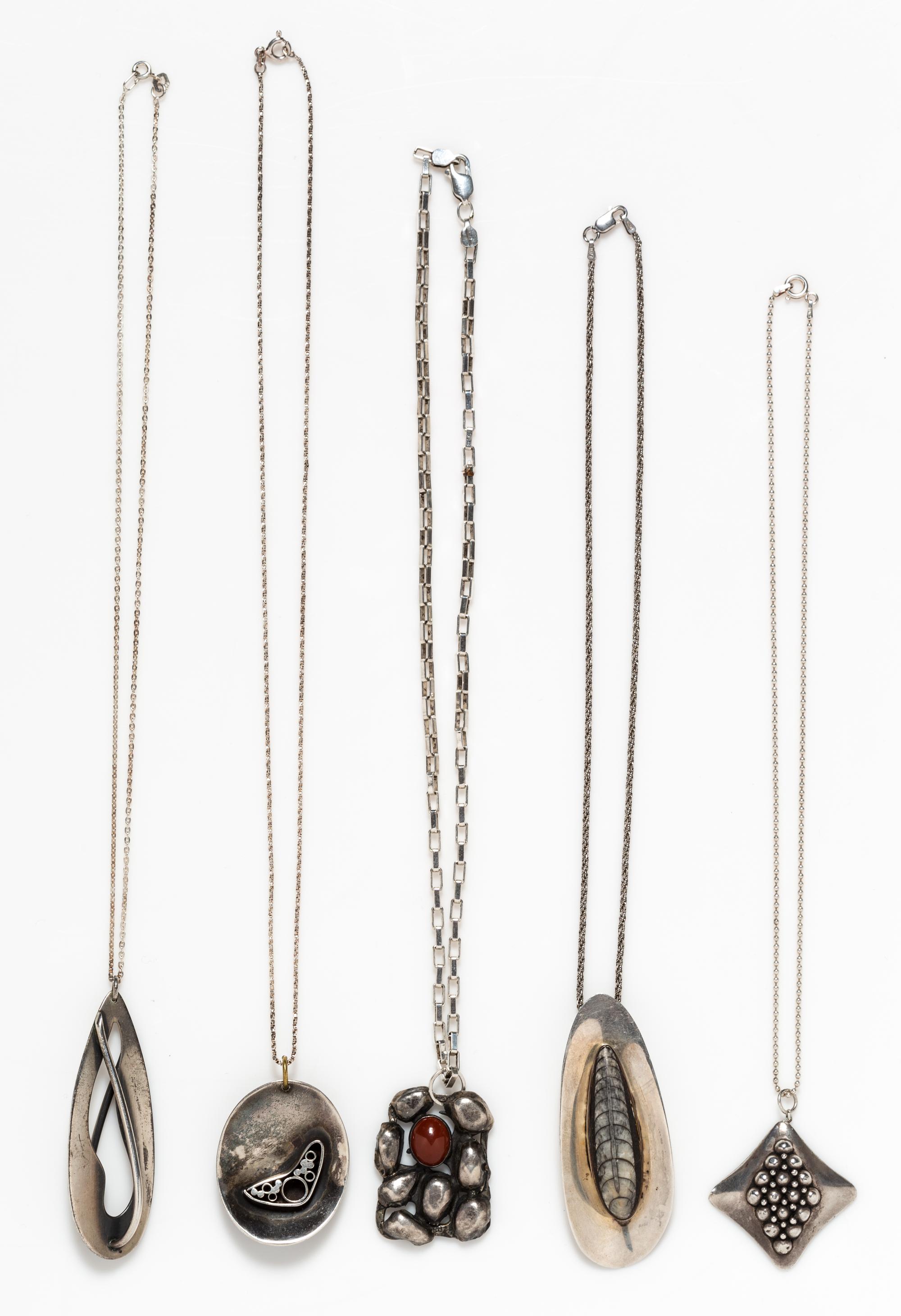 A Collection of Silver Pendant Necklaces, 50.40 dwts.