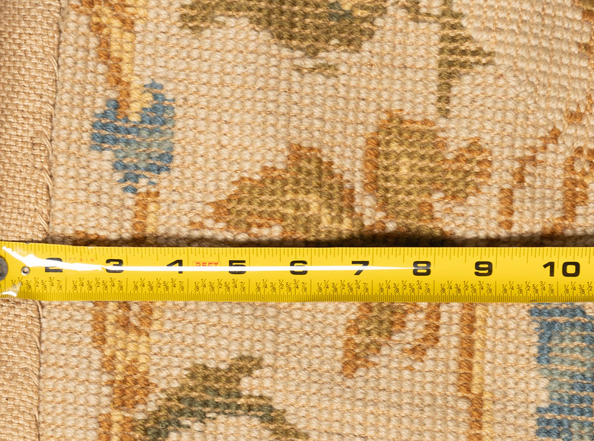 A Portuguese Needlepoint Rug