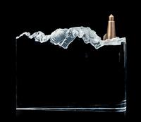 A Steuben Rock/Cliff Sculpture Length 8 3/4 inches.