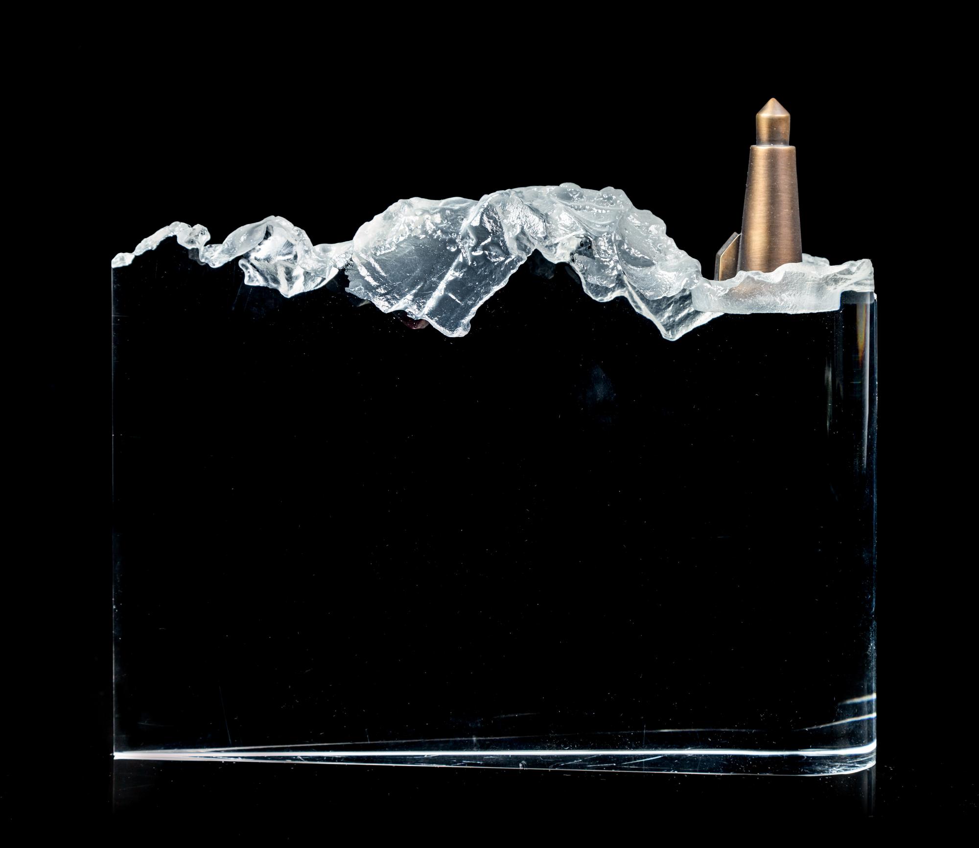 A Steuben Rock/Cliff Sculpture Length 8 3/4 inches.
