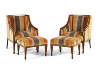 A Pair of Continental Walnut and Mahogany Bergères with Associated Ottomans