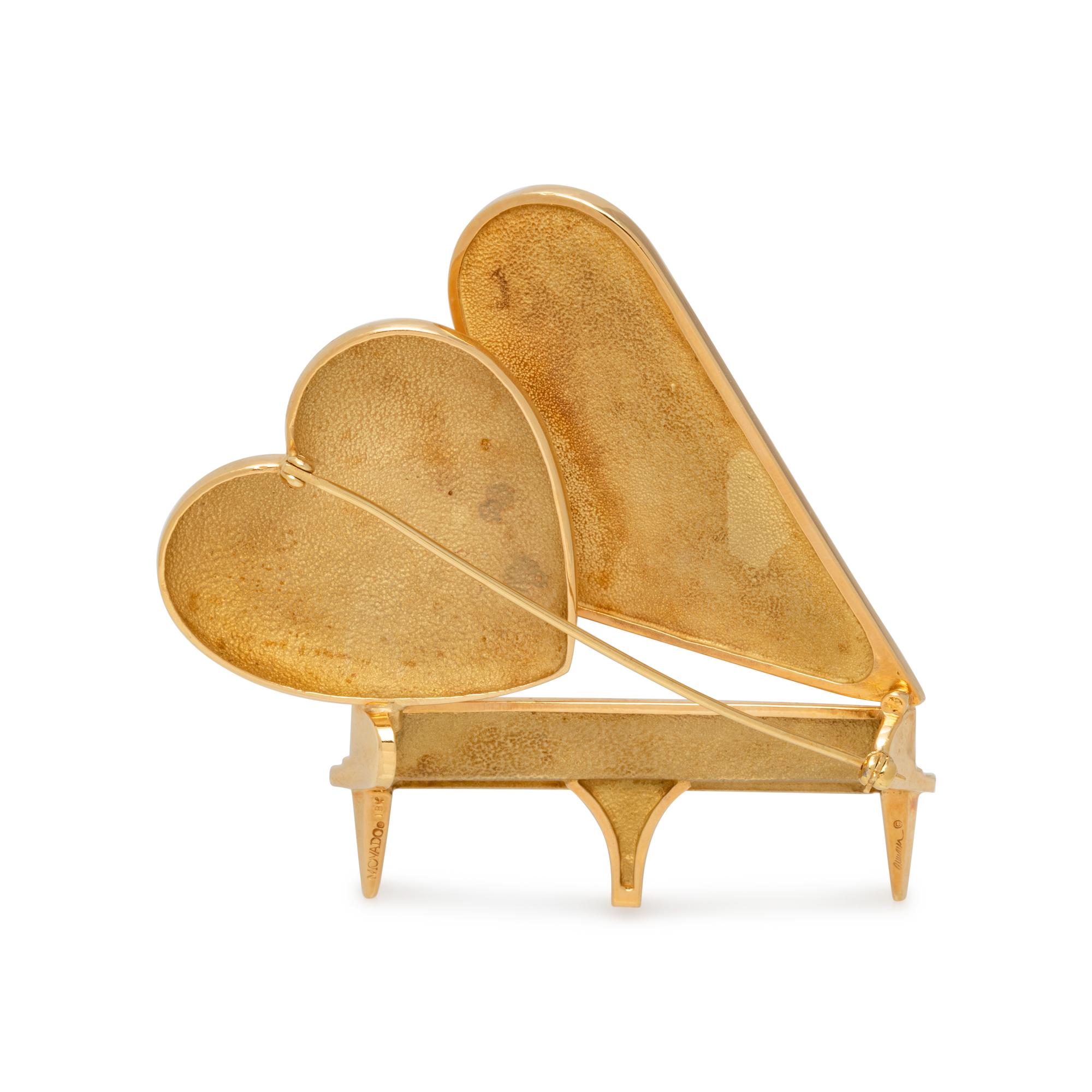 MOVADO, YELLOW GOLD PIANO BROOCH