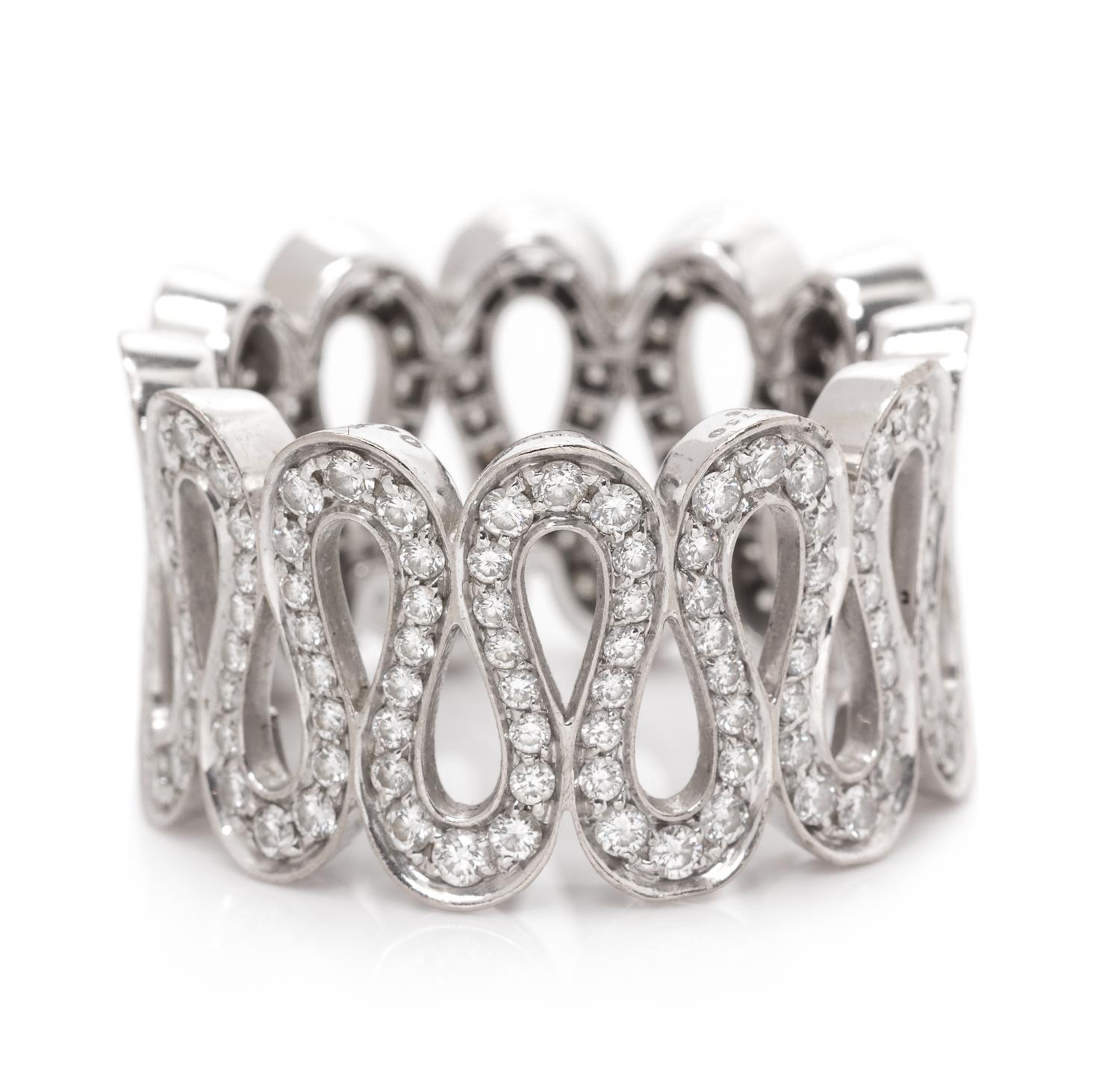 An 18 Karat White Gold and Diamond Wavy Band Ring, Boucheron, 7.10 dwts.