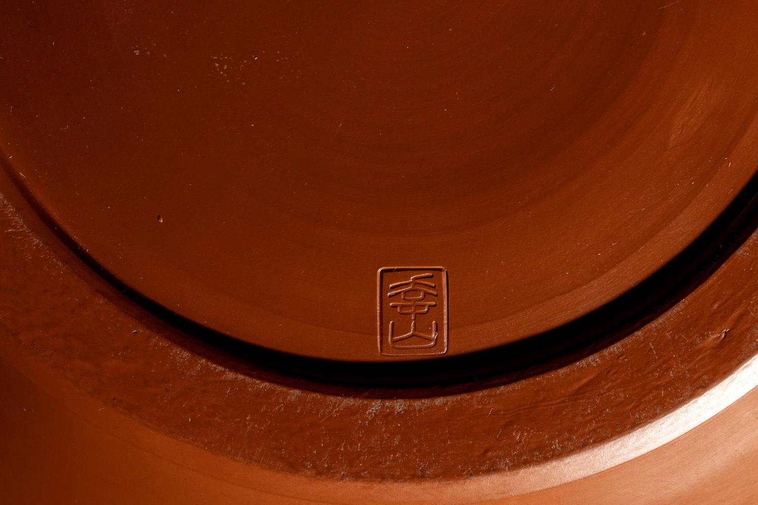 A Japanese Persimmon Glazed Pottery 'Landscape' Jar