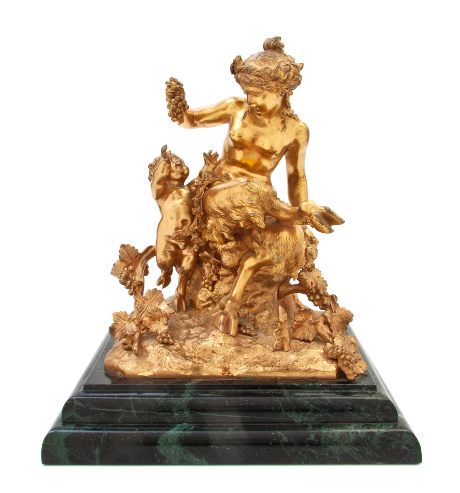 A French Gilt Bronze Figural Group, after Claude Michel Clodion, Height overall 14 1/4 inches.