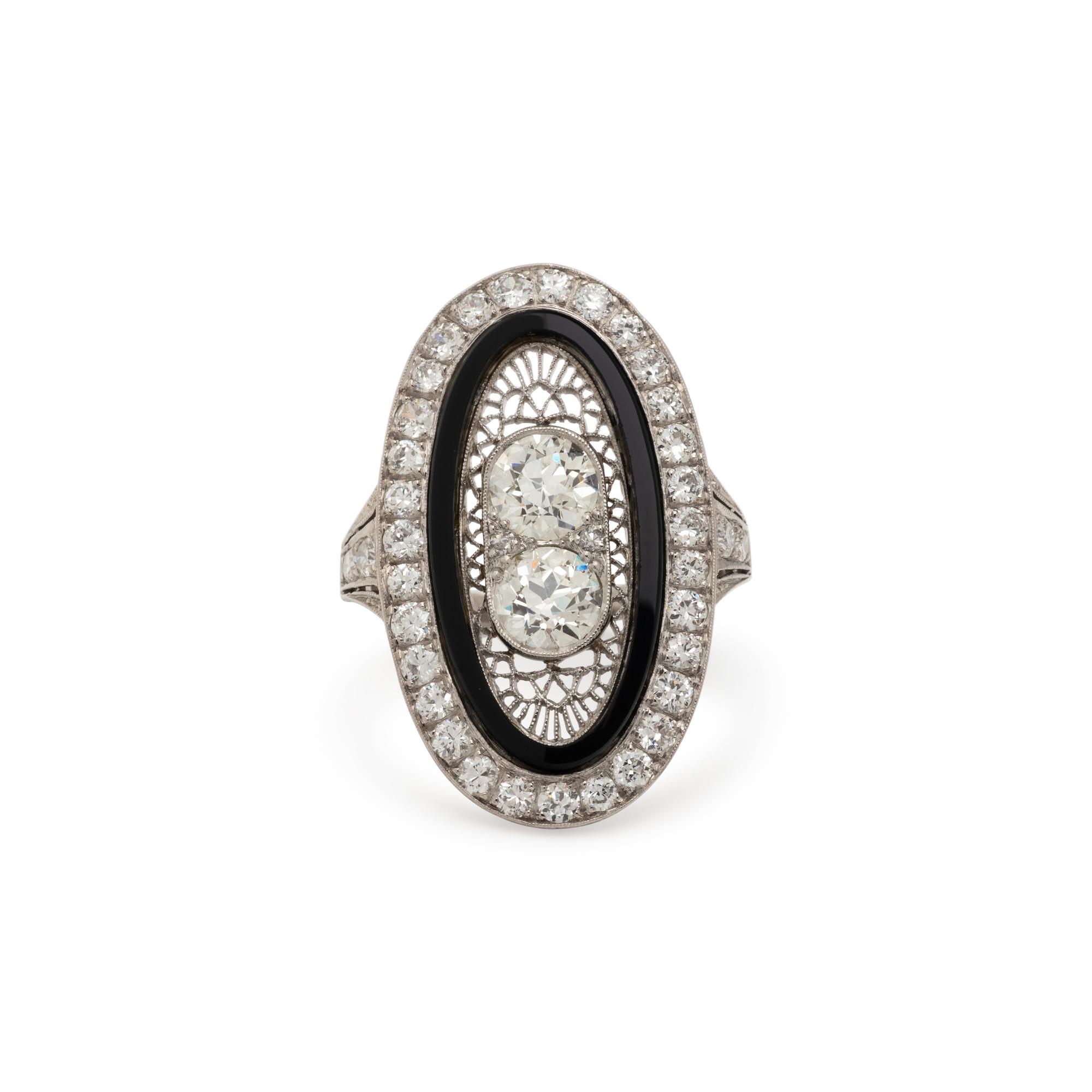 ONYX, DIAMOND, AND PLATINUM RING