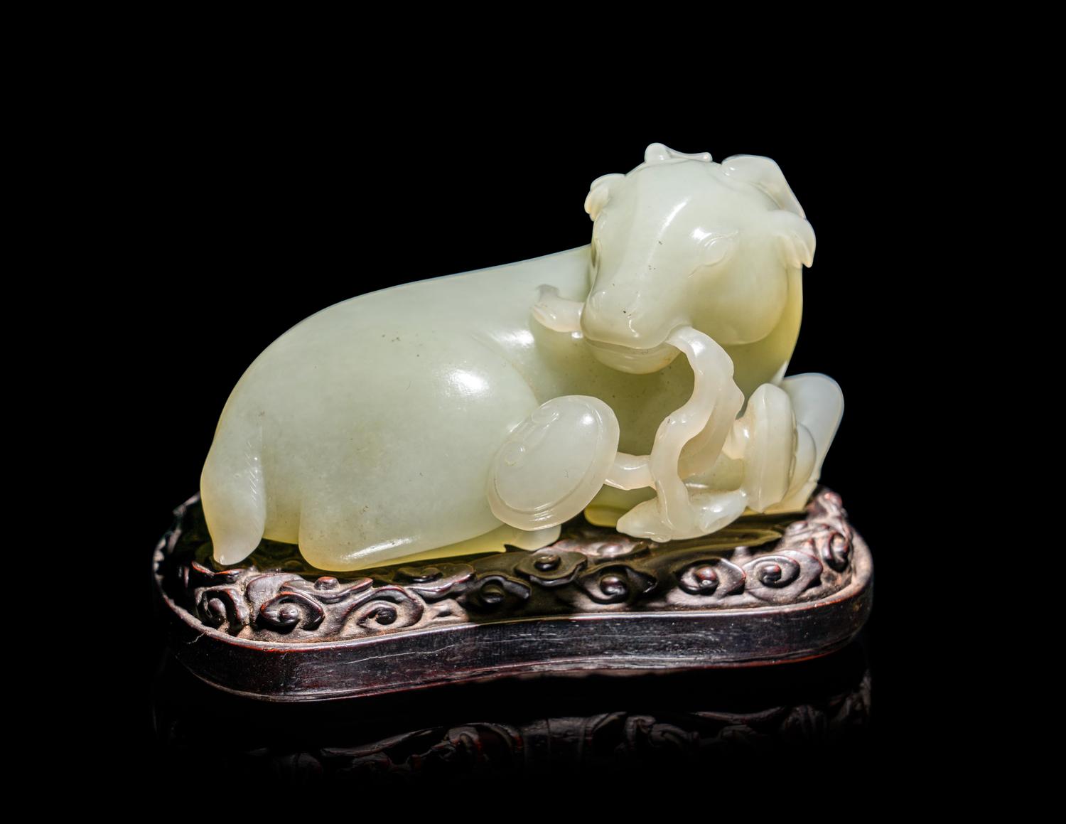 A Chinese Celadon Jade Figure of a Recumbent Ram
