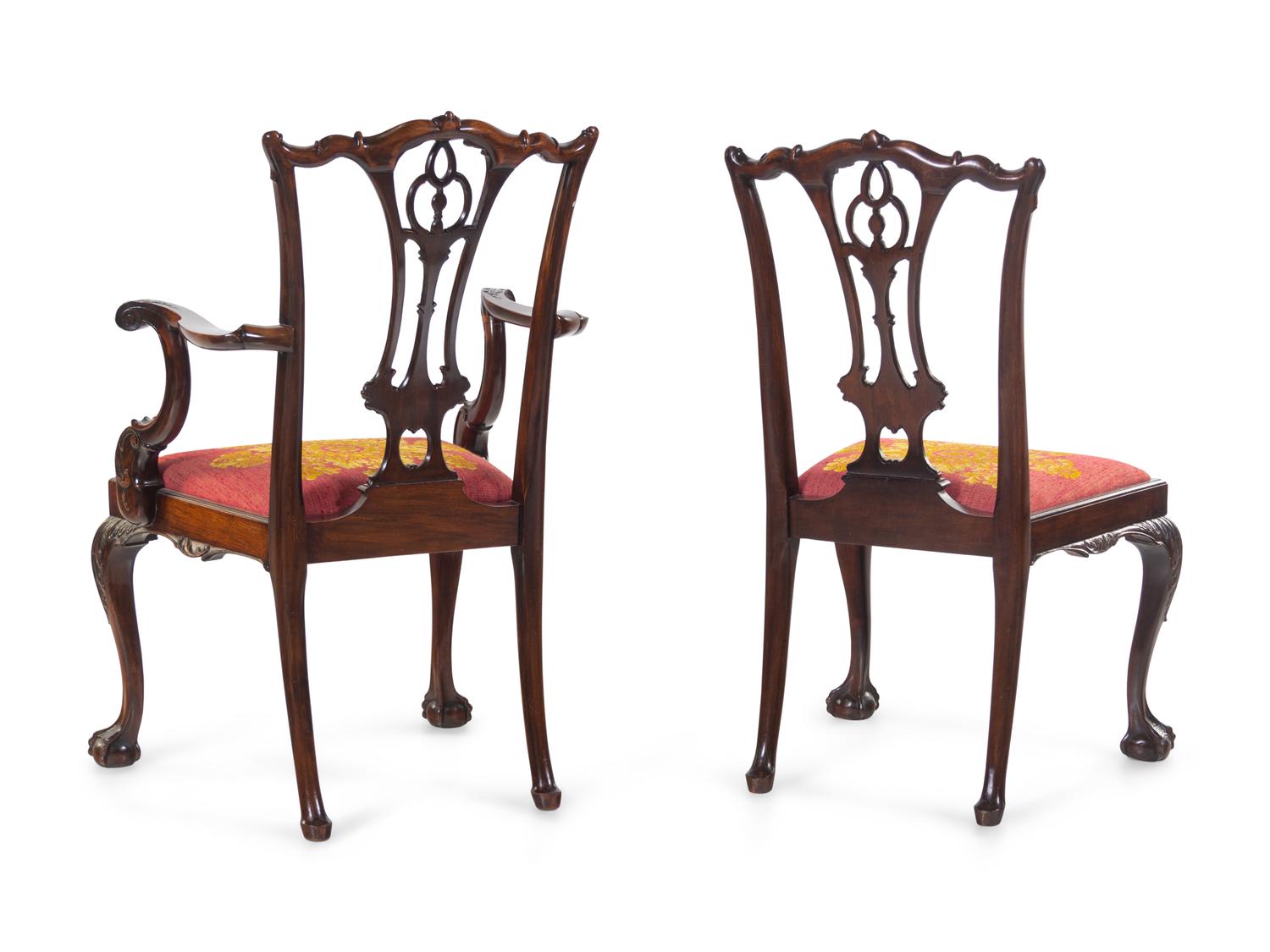 A Set of Ten George III Style Carved Mahogany Dining Chairs