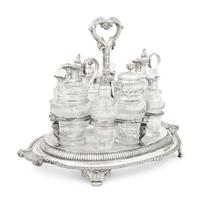 A Paul Storr Silver and Cut Glass Cruet Set