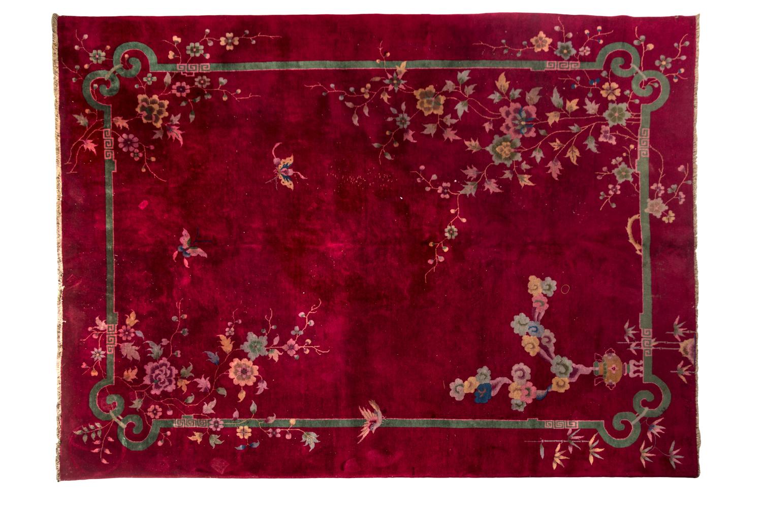 A Chinese Wool Rug 11 feet 1 inch x 8 feet 7 inches.