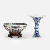 A Chinese wucai-decorated bowl, "mantou xin", and a Chinese blue and white porcelain Gu-form vase The bowl Kangxi period, the vase later