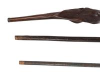Three Carved Walnut Walking Sticks