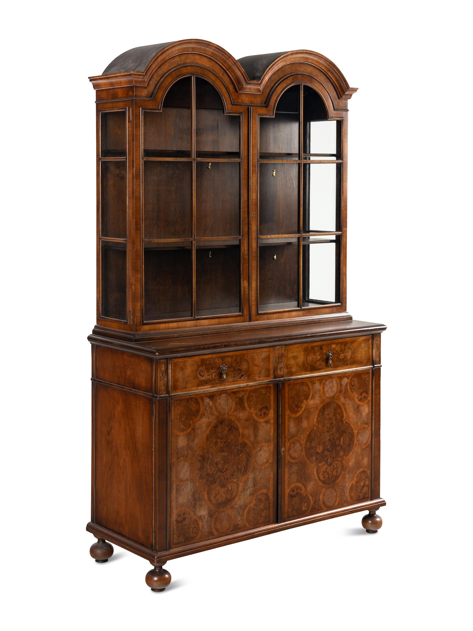 A William and Mary Style Walnut and Marquetry Bookcase