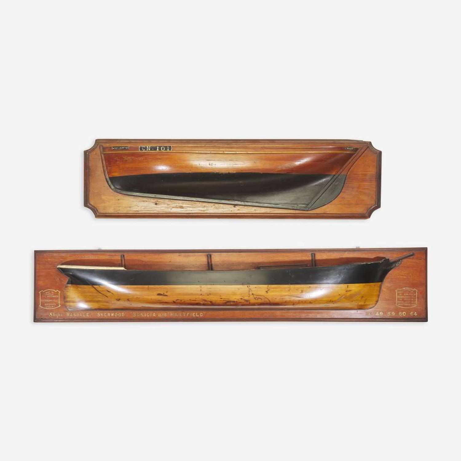 Two carved and painted half hull ship models late 19th/early 20th century