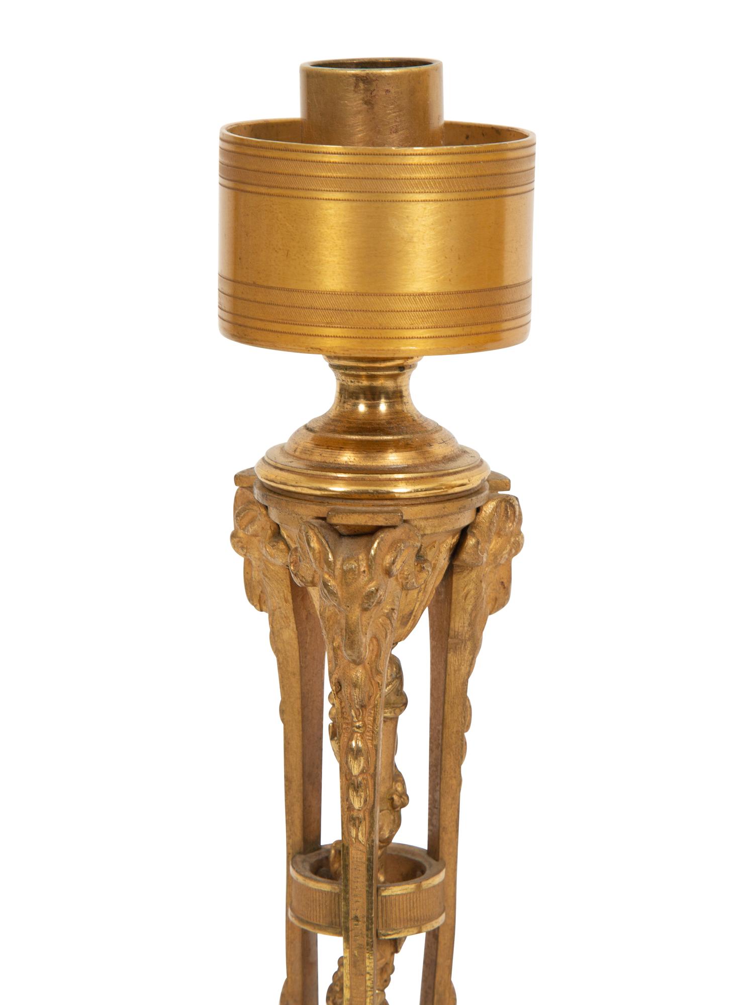 A Pair of French Gilt Bronze Tripartite Candlesticks