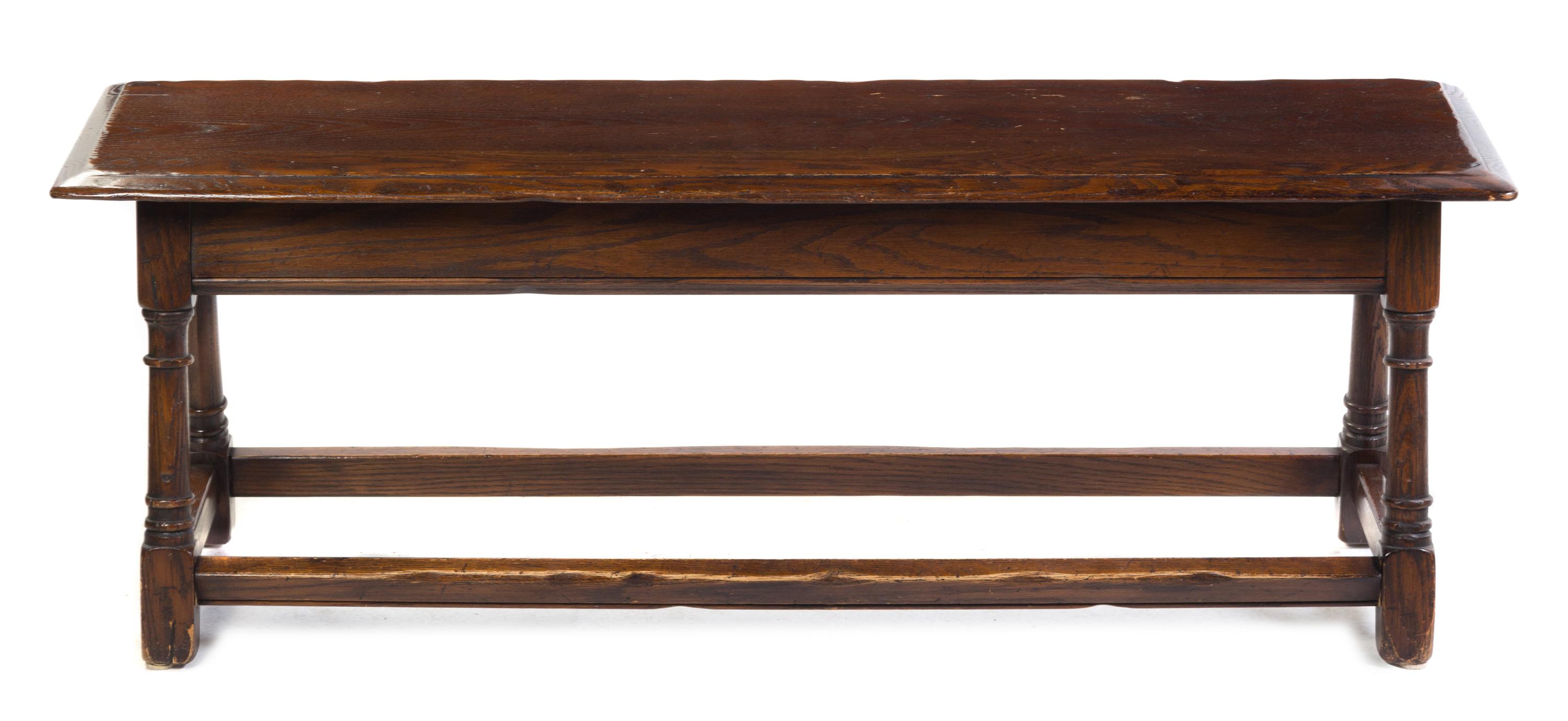 A Jacobean Style Oak Bench Height 17 x width 48 x depth 13 3/4 inches. — 20TH CENTURY