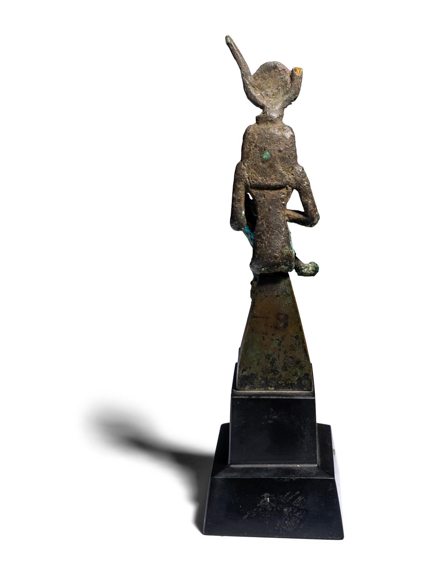 An Egyptian Bronze Isis Nursing Harpocrates
