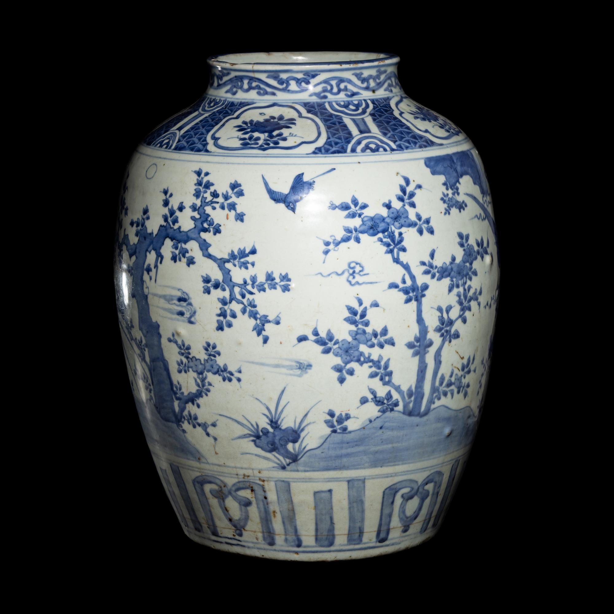 A Chinese Blue and White 'Birds and Trees' Porcelain Jar, 16th/17th Century 明末清初 青花花鳥圖大罐