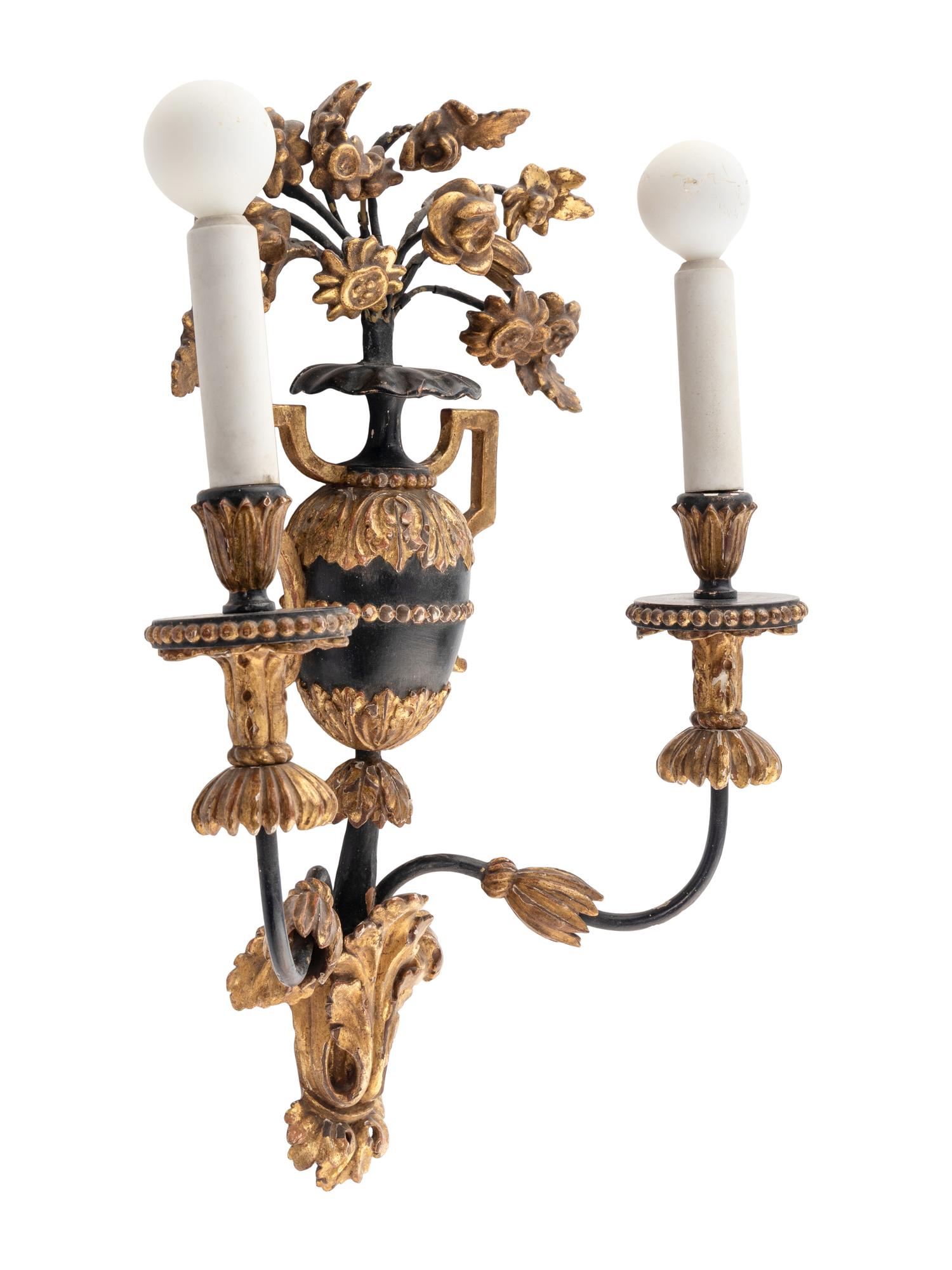 A Set of Four Italian Painted and Parcel Gilt Sconces
