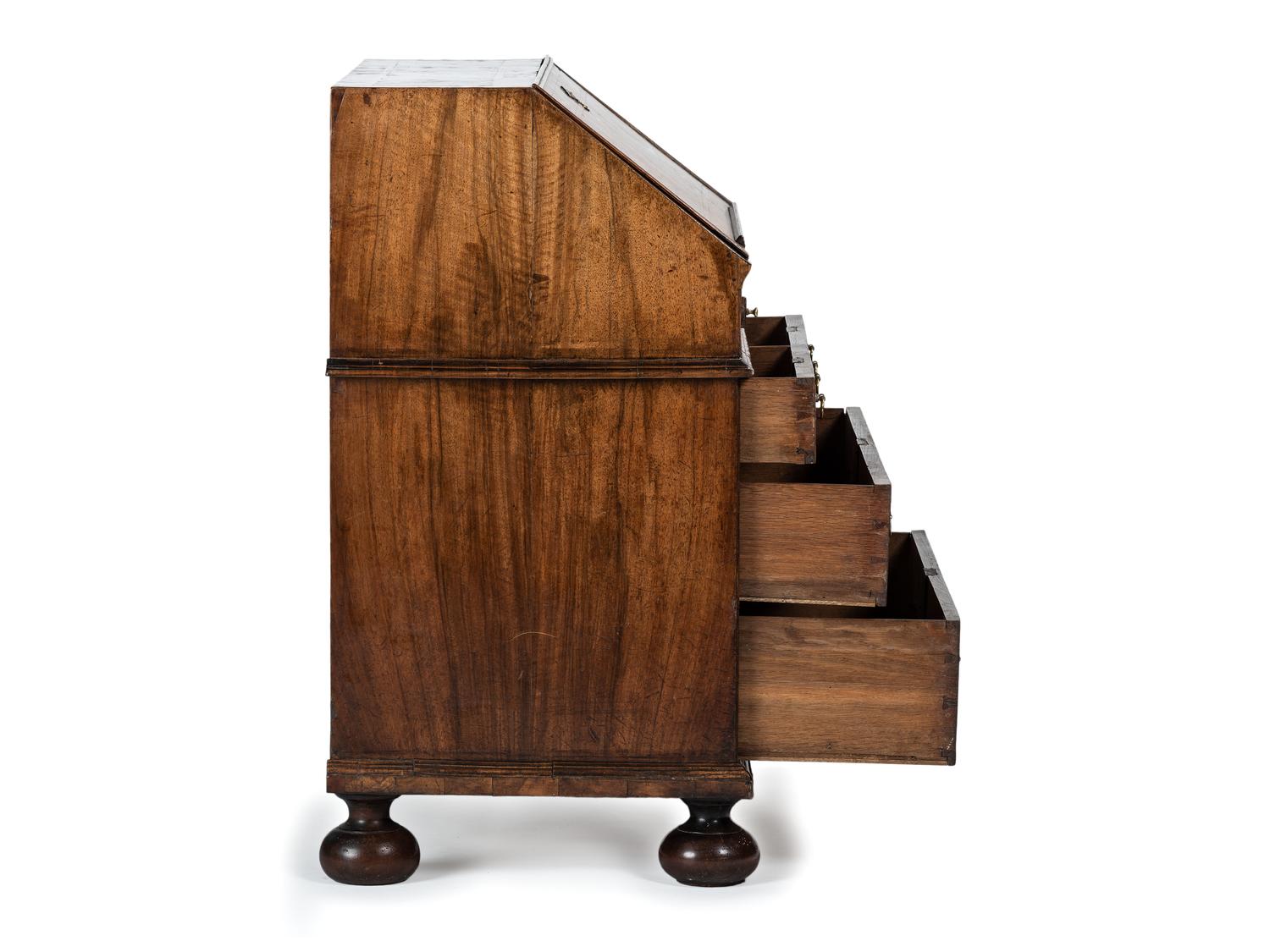 A William and Mary Style Figured Walnut Slant Front Desk
