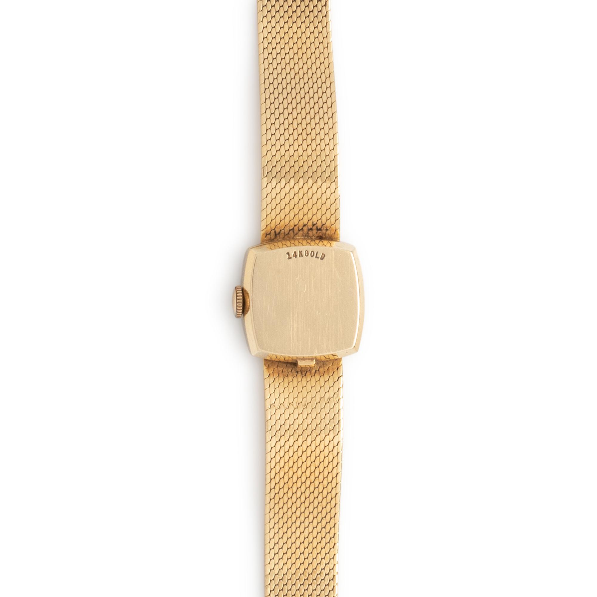 OMEGA, RETAILED BY TIFFANY & CO., 14K YELLOW GOLD AND DIAMOND WATCH