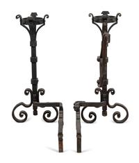 A Pair of Continental Iron Andirons with Posset Cup Holders