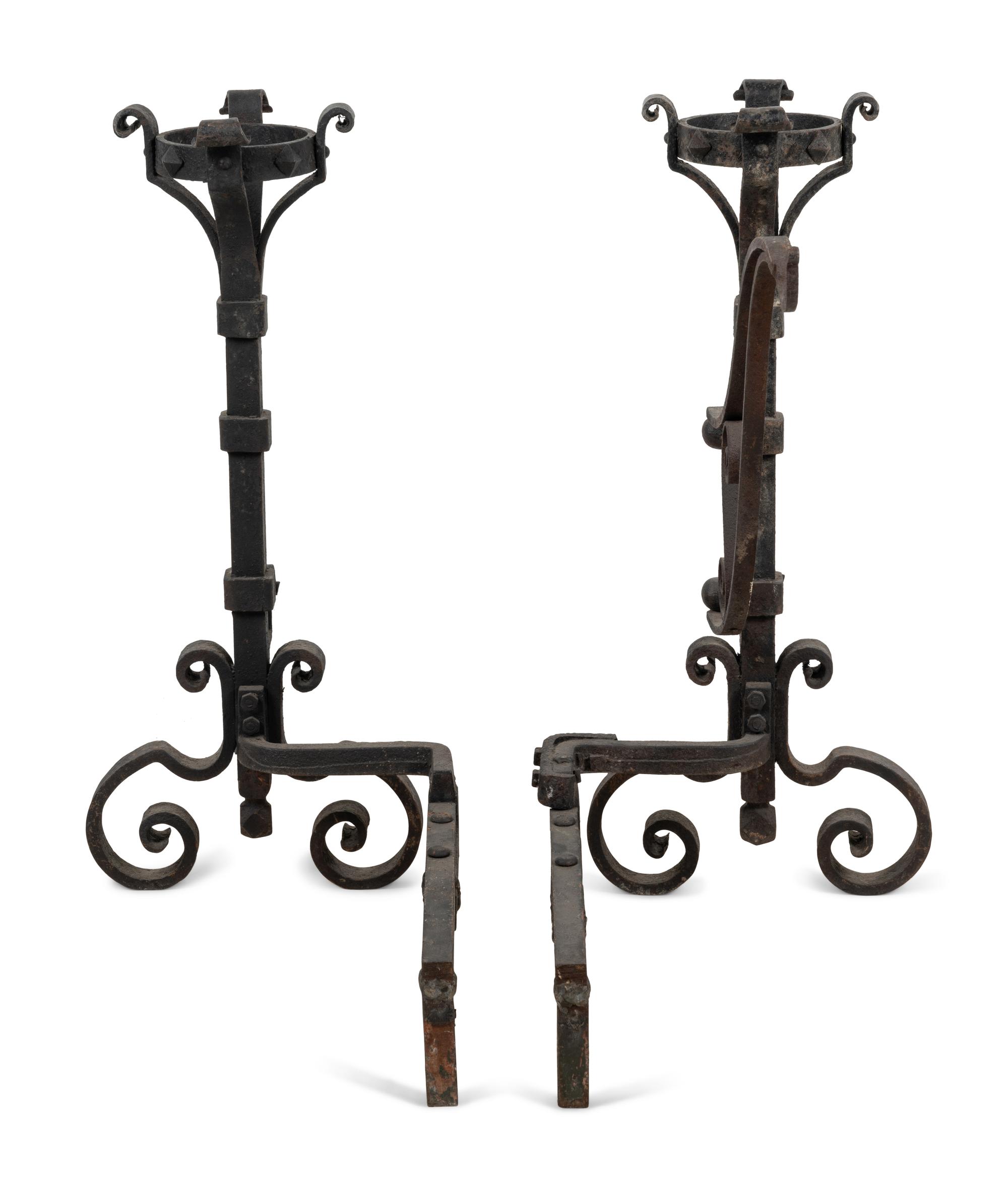 A Pair of Continental Iron Andirons with Posset Cup Holders