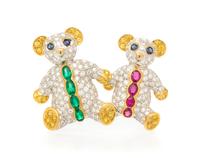 An 18 Karat Gold, Diamond, Emerald, Ruby and Sapphire Brooch, 11.40 dwts.