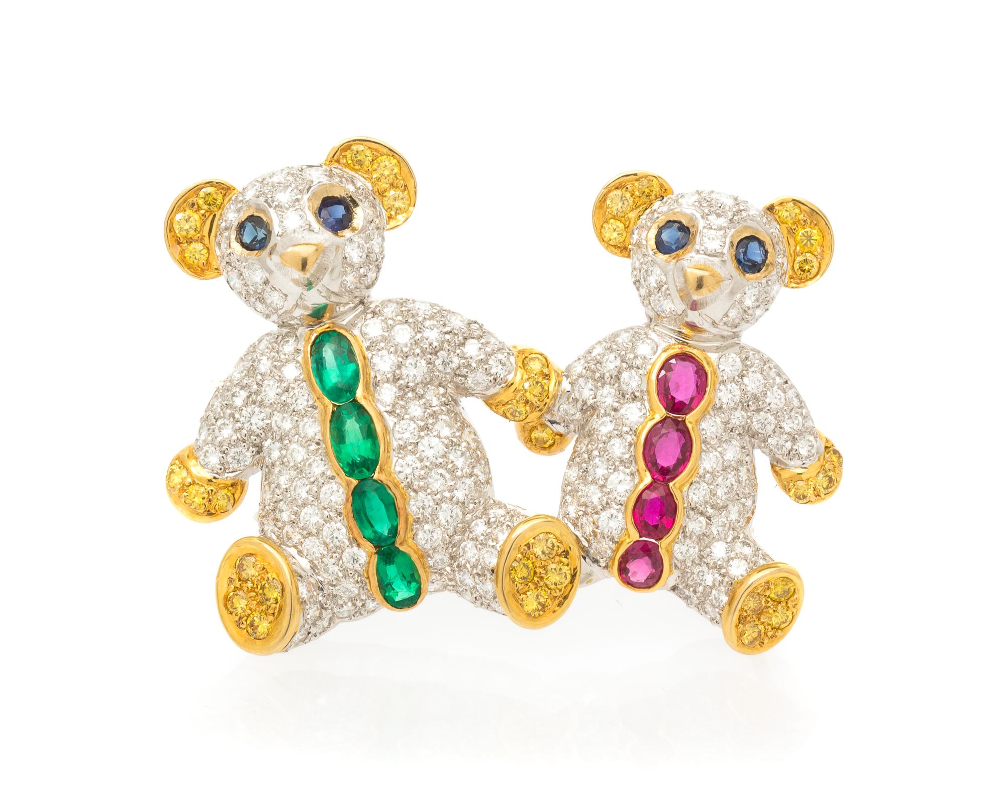 An 18 Karat Gold, Diamond, Emerald, Ruby and Sapphire Brooch, 11.40 dwts.