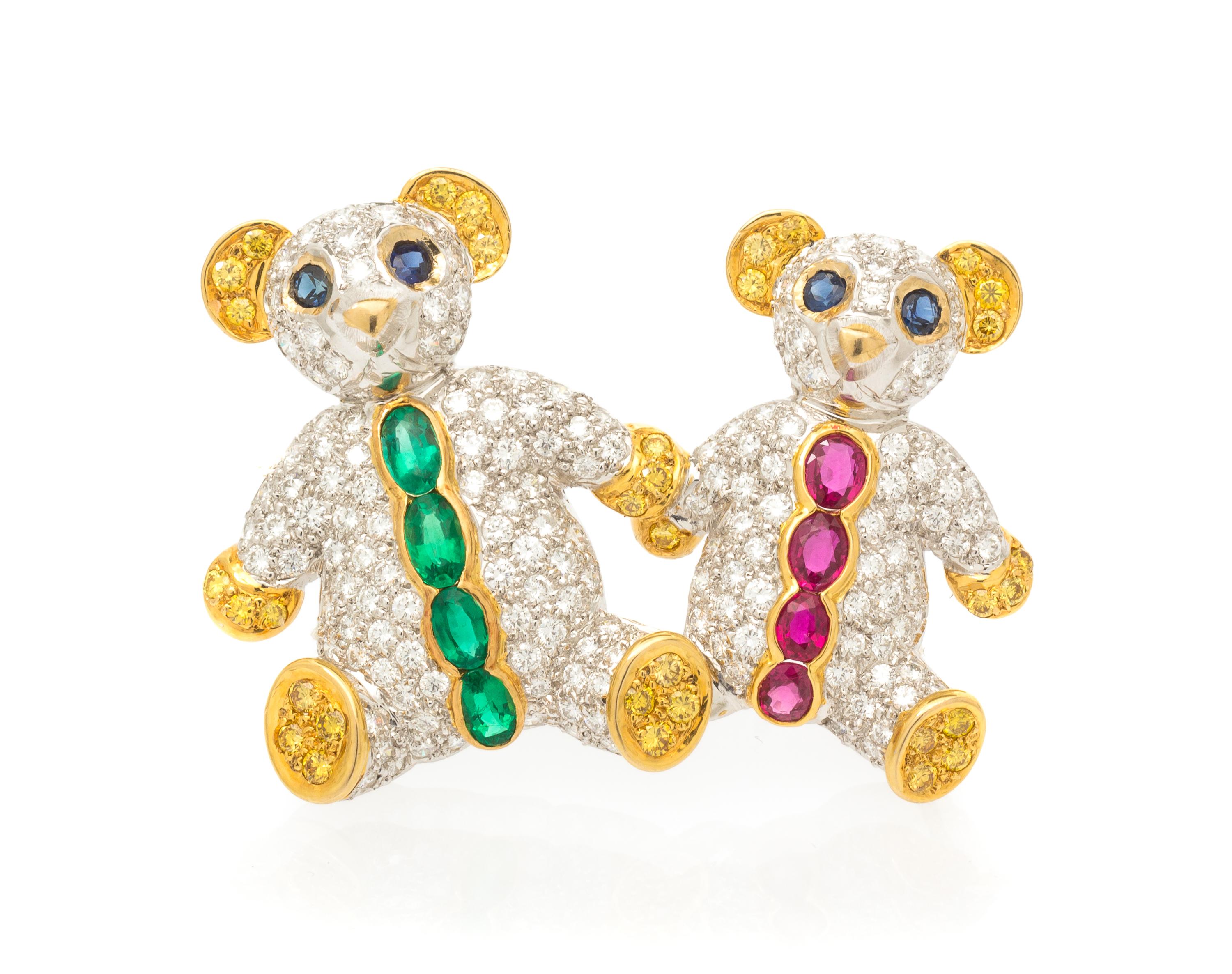 An 18 Karat Gold, Diamond, Emerald, Ruby and Sapphire Brooch, 11.40 dwts.