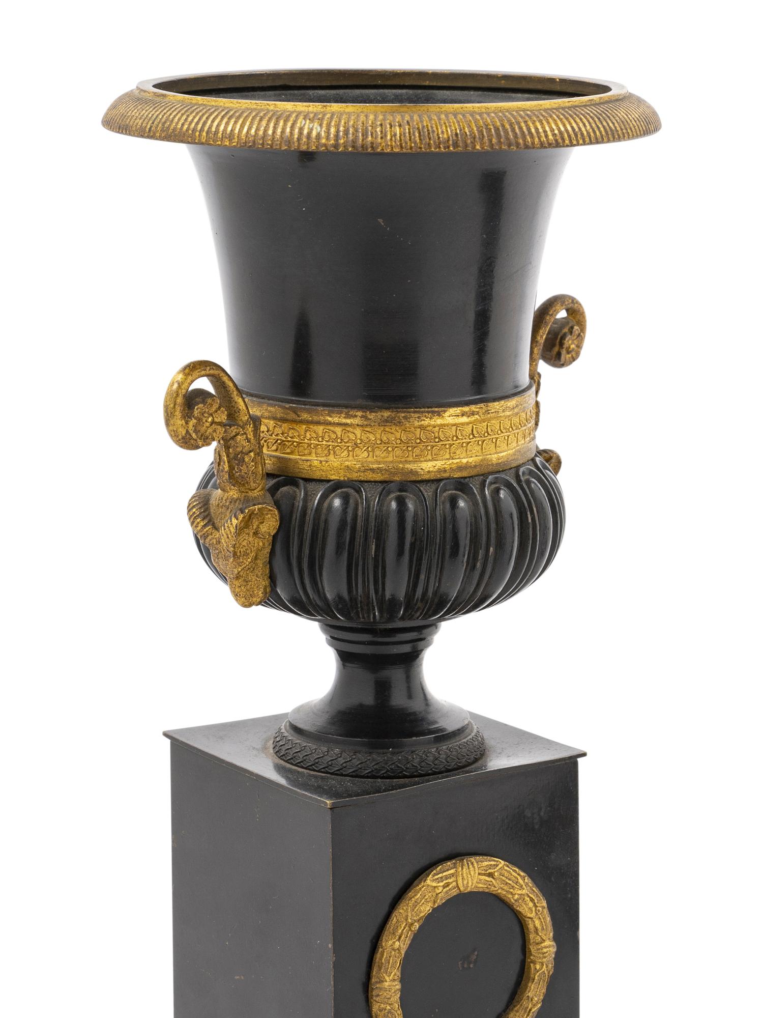 A Pair of Empire Style Gilt and Patinated Bronze Campagna Urns