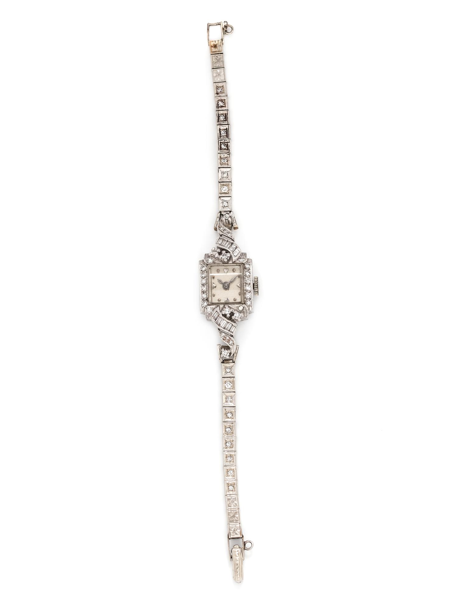 PLATINUM, WHITE GOLD AND DIAMOND WRISTWATCH