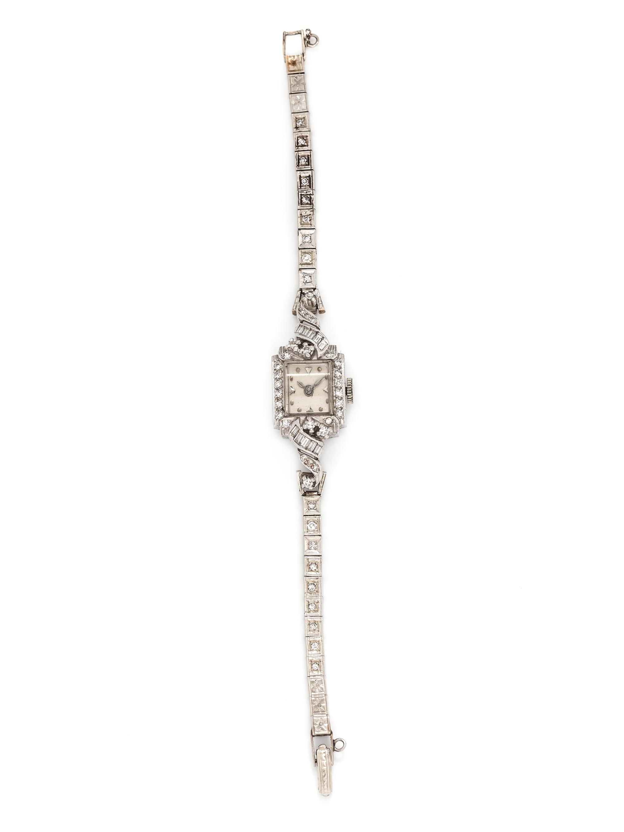 PLATINUM, WHITE GOLD AND DIAMOND WRISTWATCH