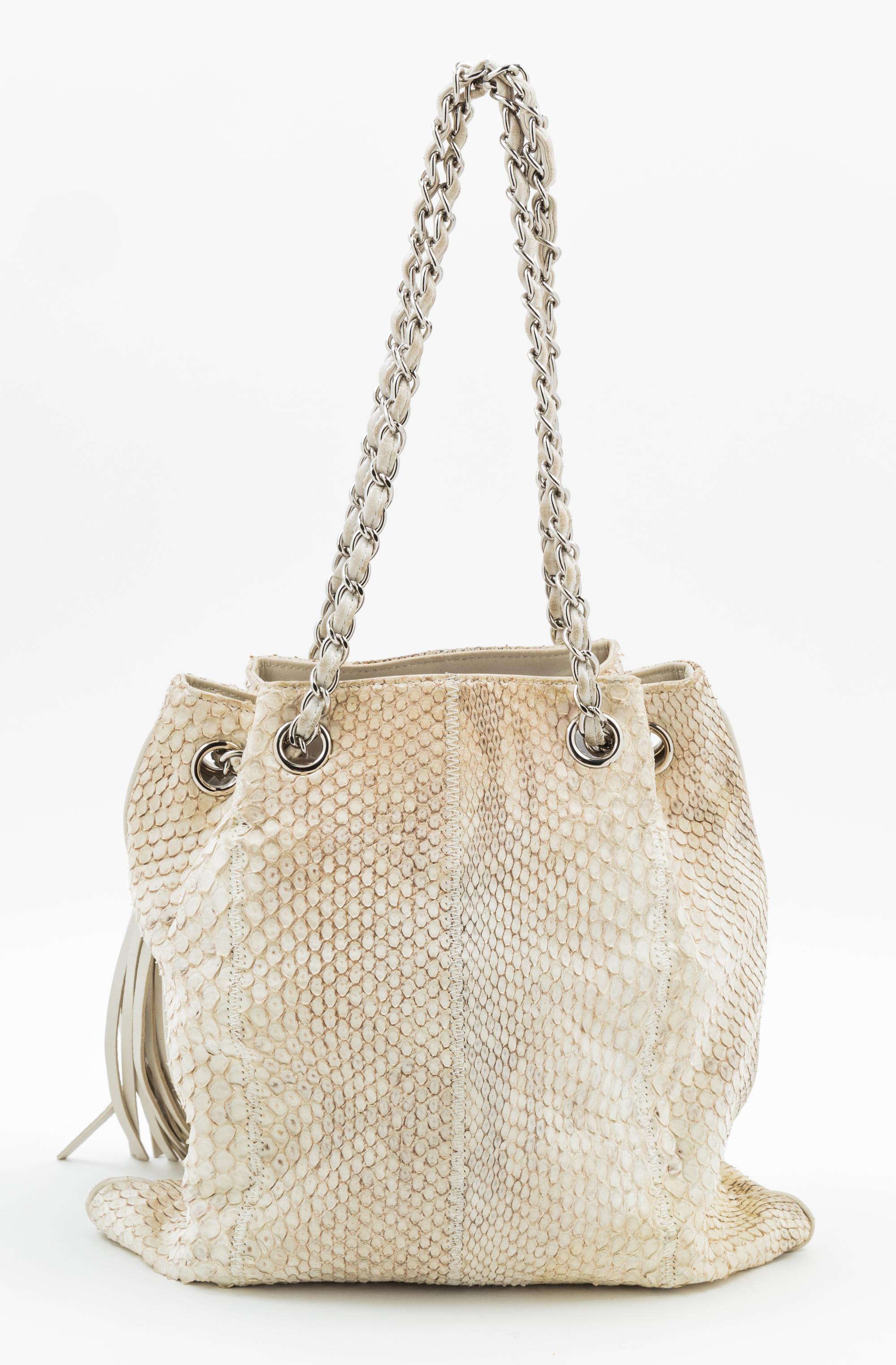 A Chanel Cream and Grey Python Drawstring Bag, 11" x 11" x .5"; Strap drop: 8".