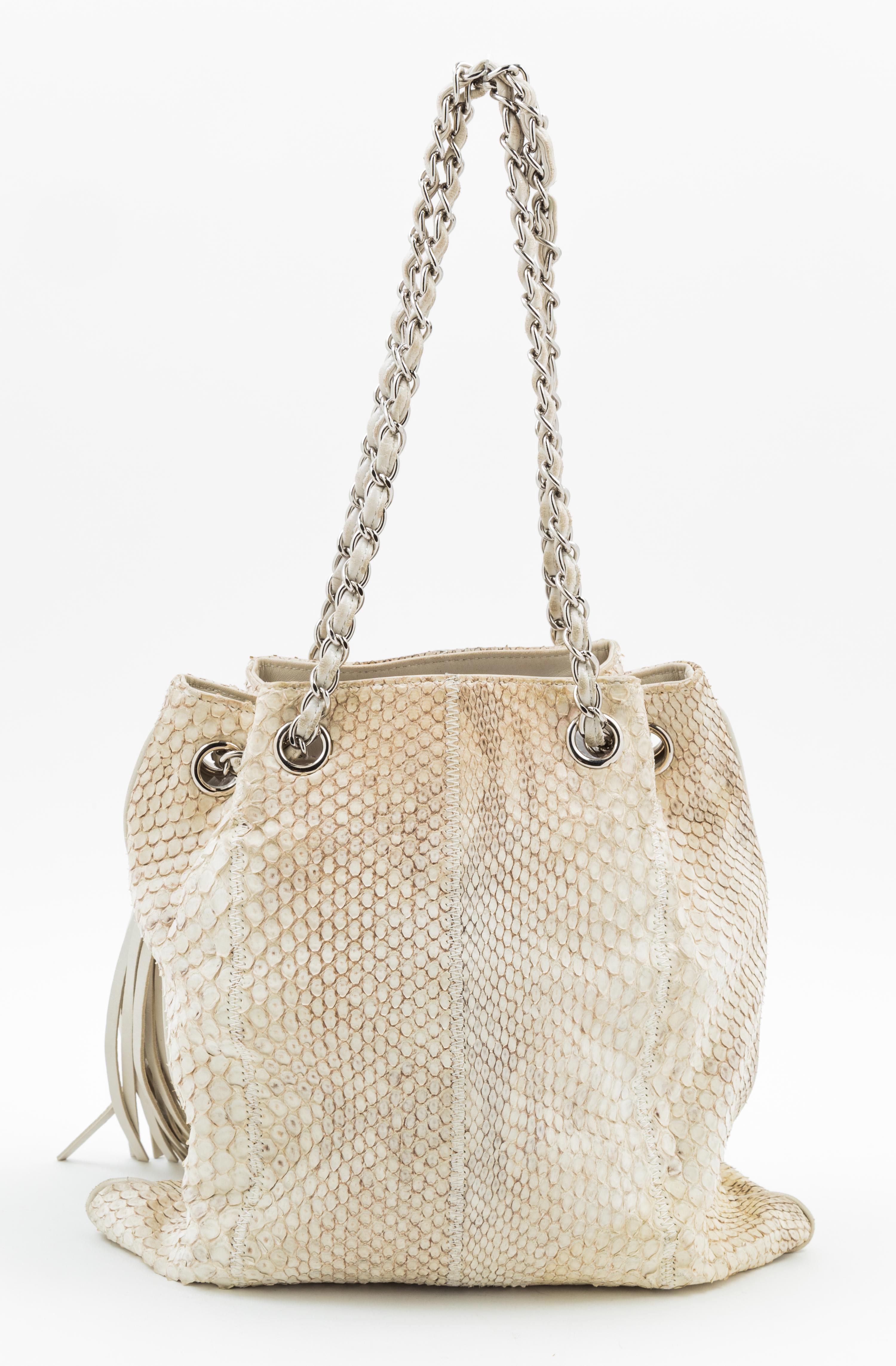 A Chanel Cream and Grey Python Drawstring Bag, 11" x 11" x .5"; Strap drop: 8".