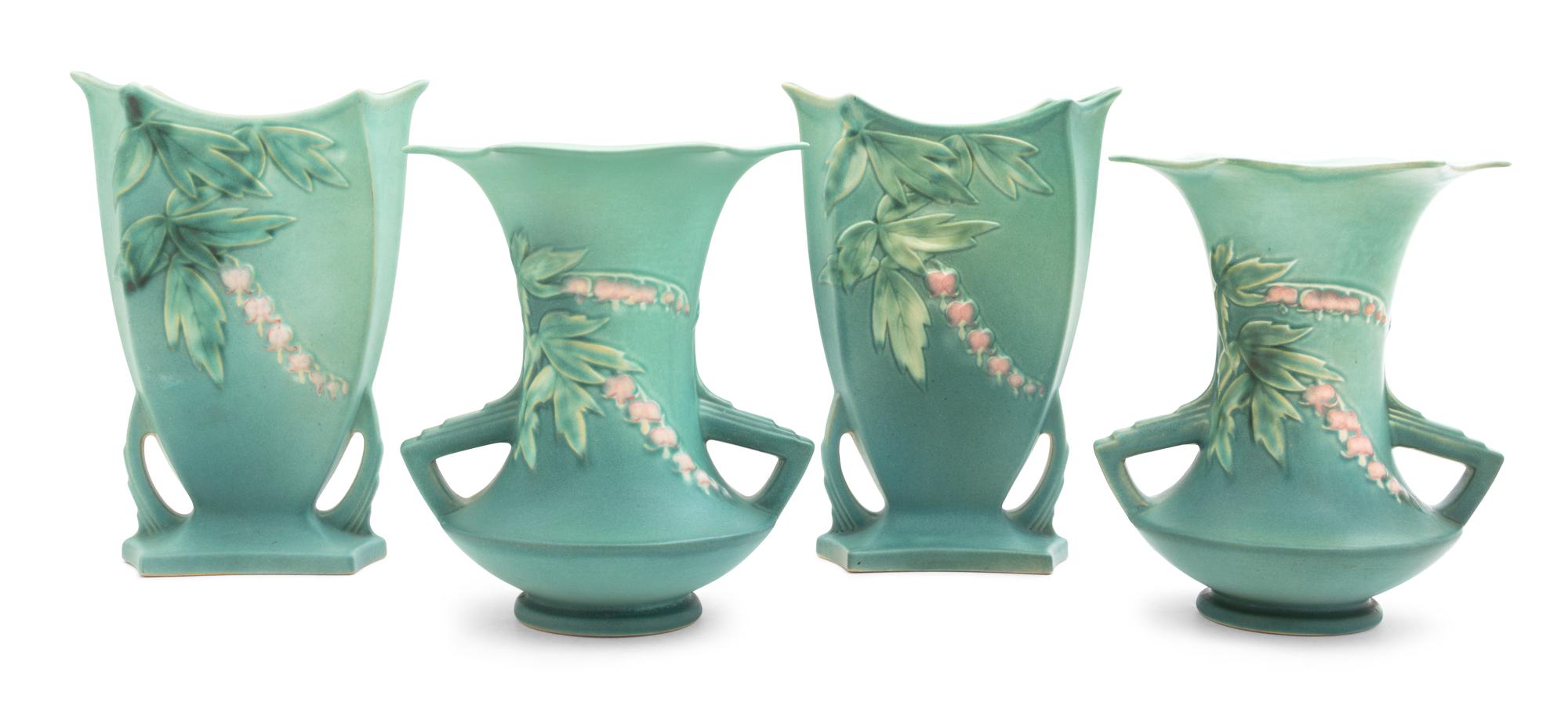 Two Pairs of Roseville Bleeding Heart Pottery Vases Height of first 9 1/4 inches, second 8 1/4 inches.