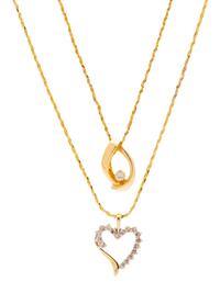 A Collection of Yellow Gold and Diamond Pendant/Necklaces,