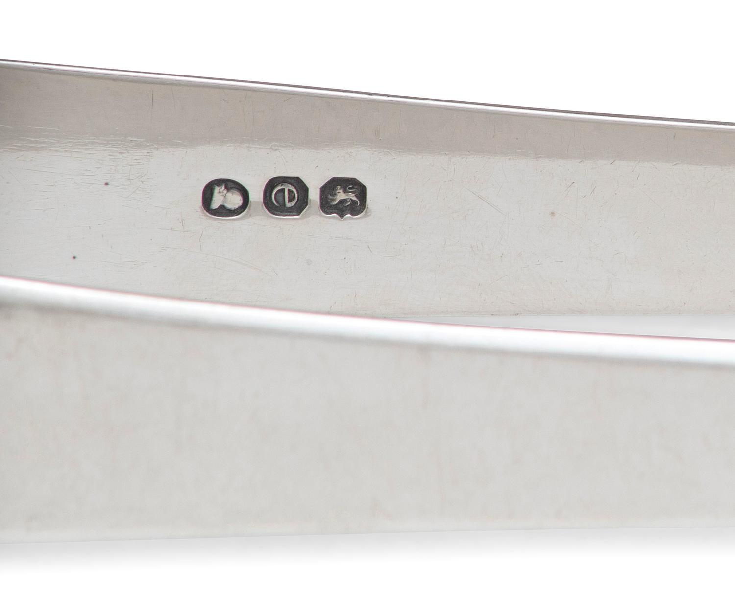 A Collection of Irish and English Silver Flatware Articles