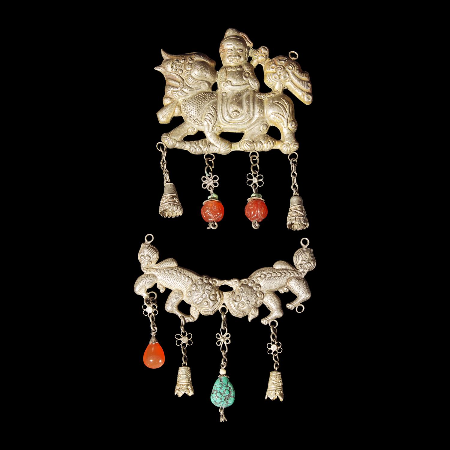 A Group of 10 Assorted Chinese Silver 'Boy and Qilin' Pendants, Late Qing Dynasty-Republic Period 晚清-民國 銀麒麟送子墜瑪瑙長命鎖及其他一組十件