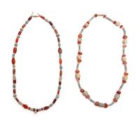 Two Near Eastern Carnelian and Faience Bead Necklaces