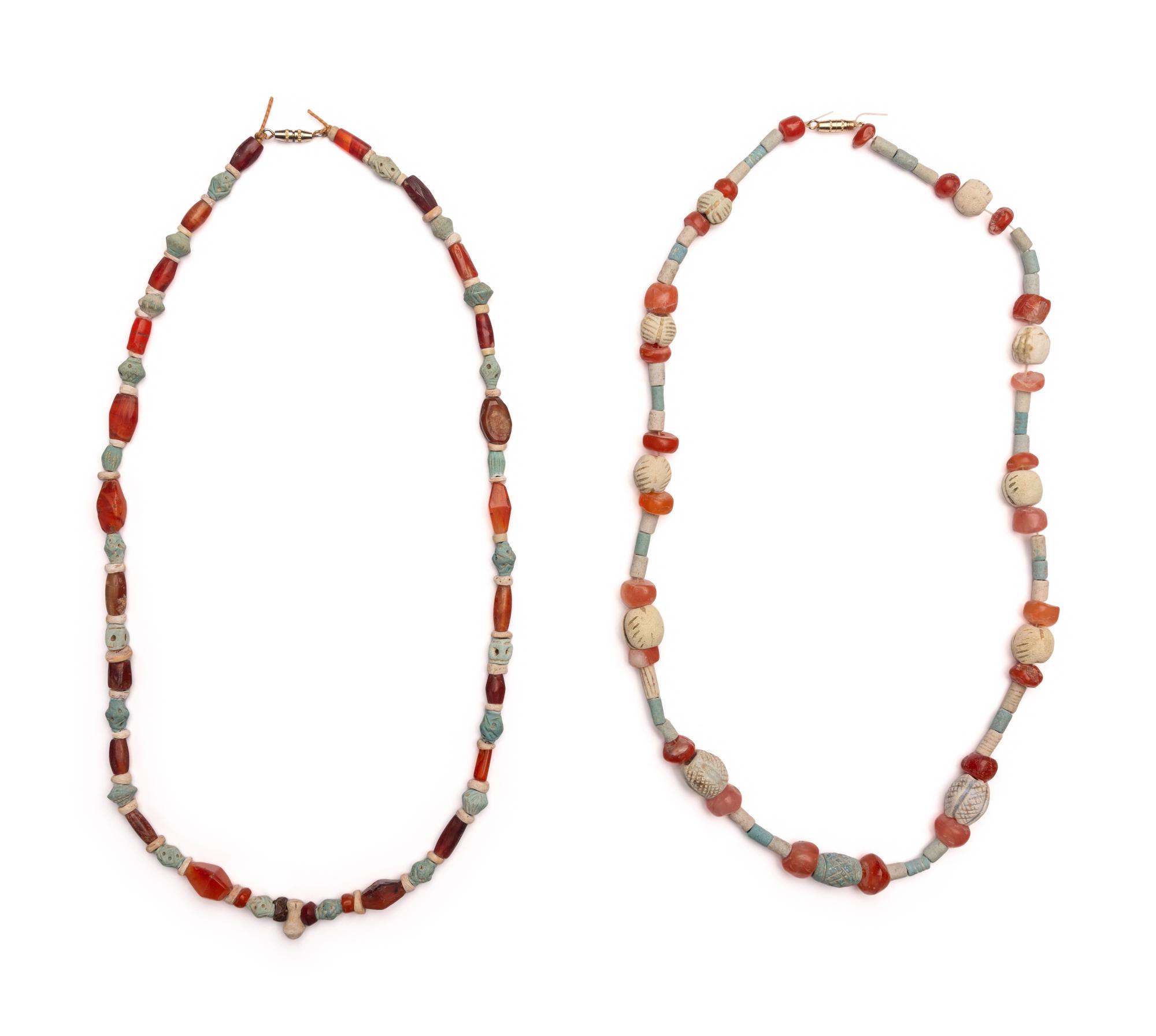 Two Near Eastern Carnelian and Faience Bead Necklaces