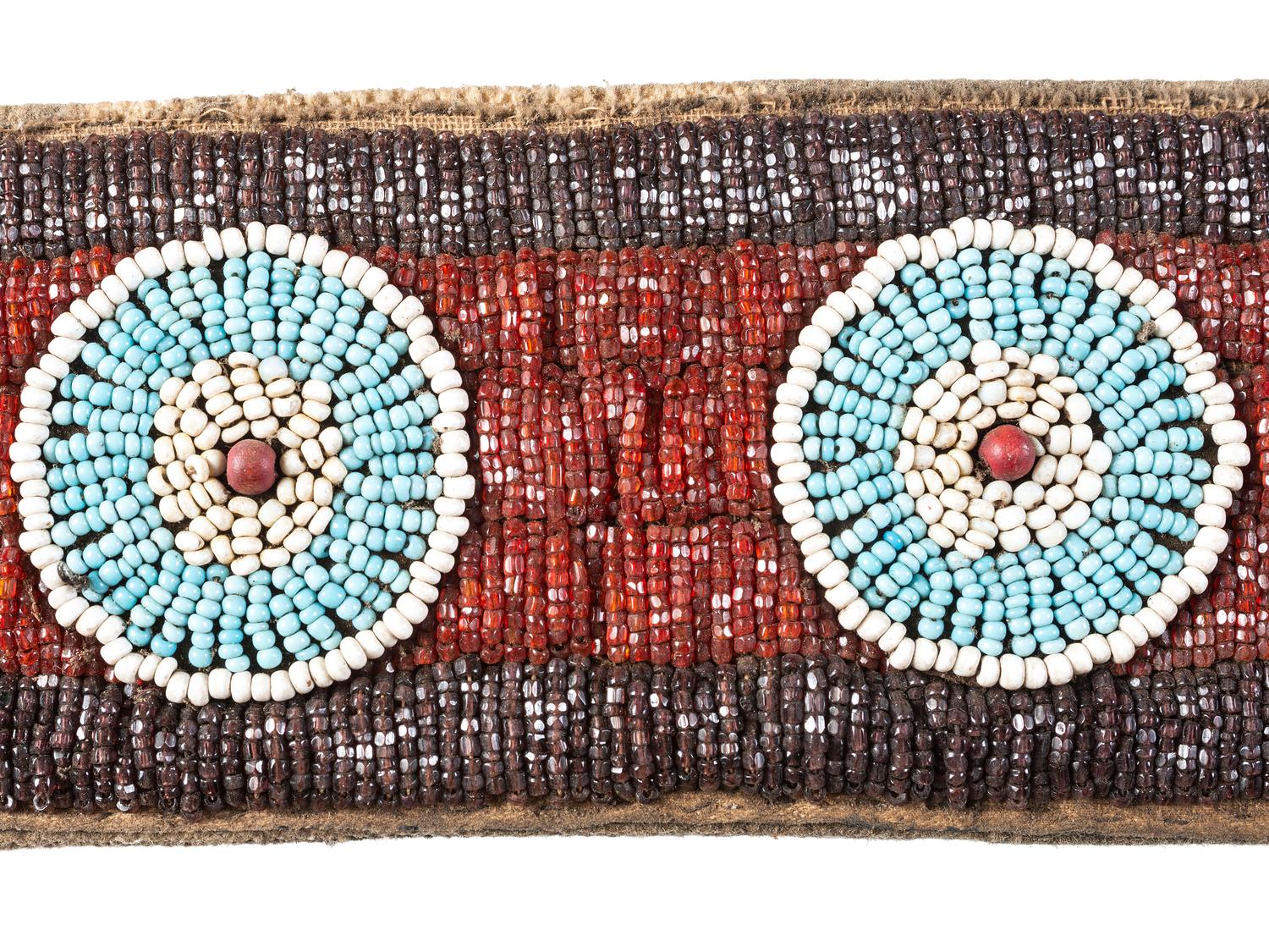 Collection of Plateau Belts, Gauntlets, and Armbands