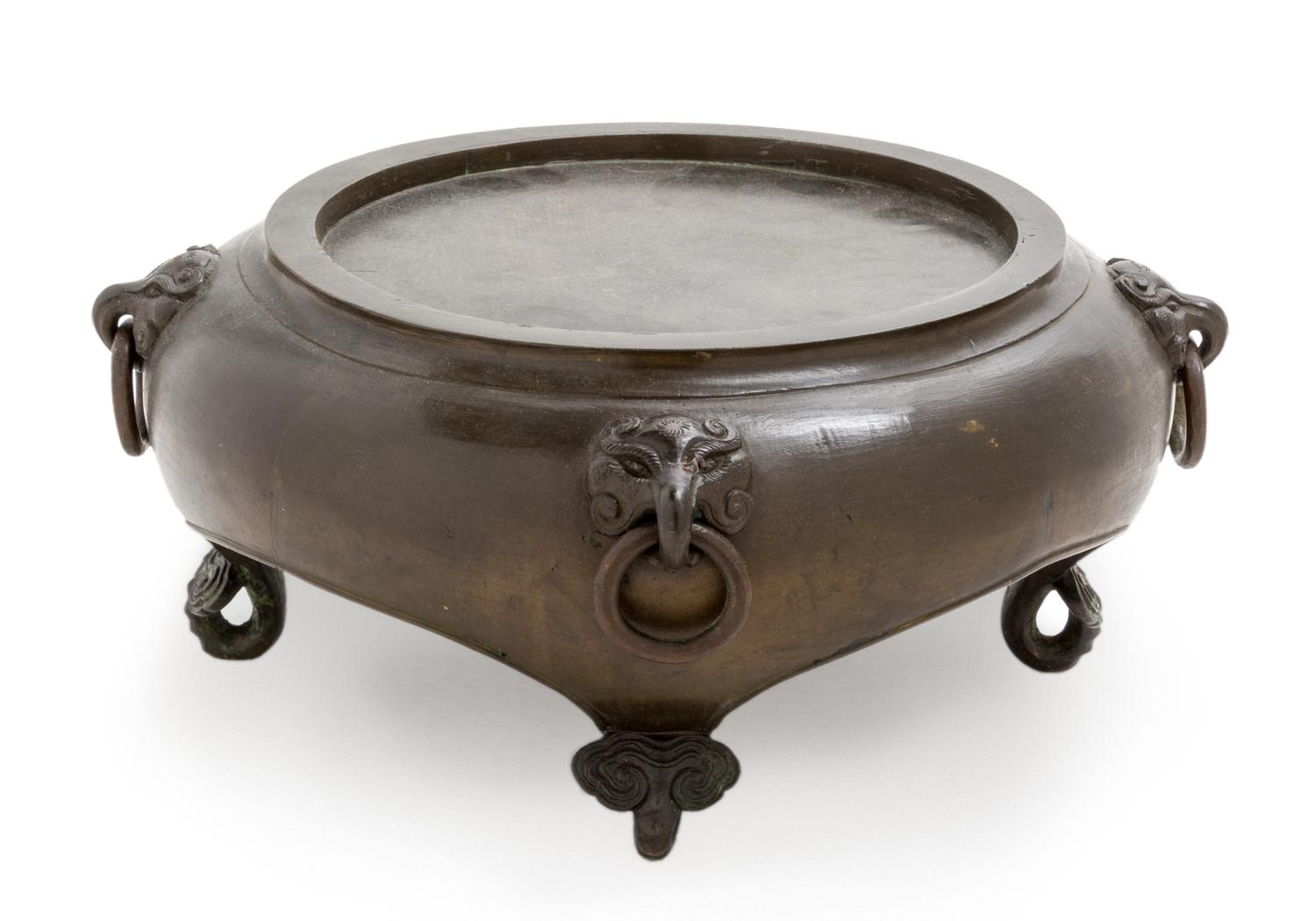 A Bronze Stand Height 4 1/2 inches.