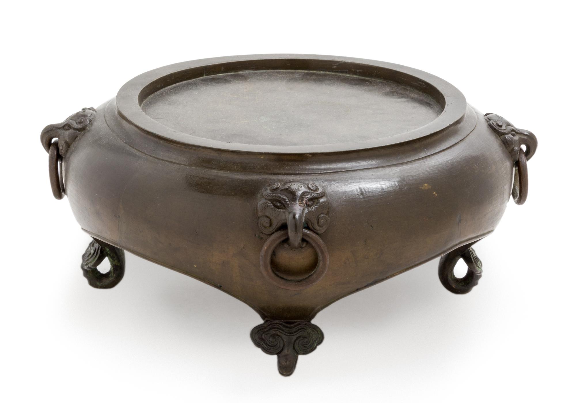 A Bronze Stand Height 4 1/2 inches.