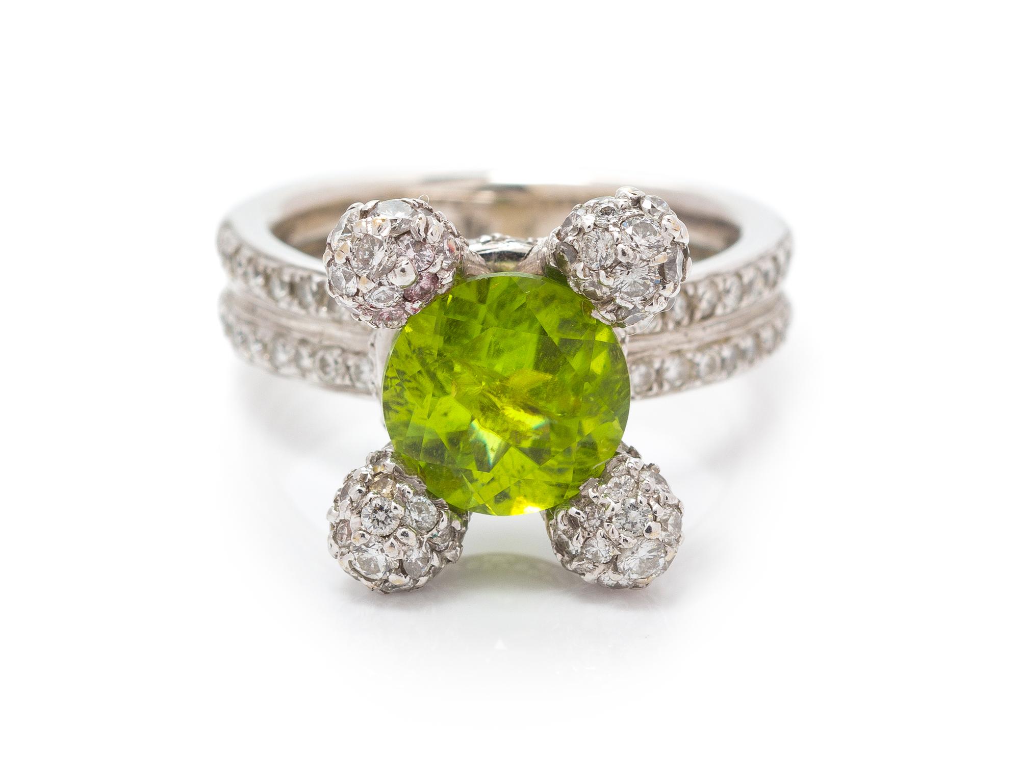A White Gold, Peridot and Diamond Ring, 10.60 dwts.
