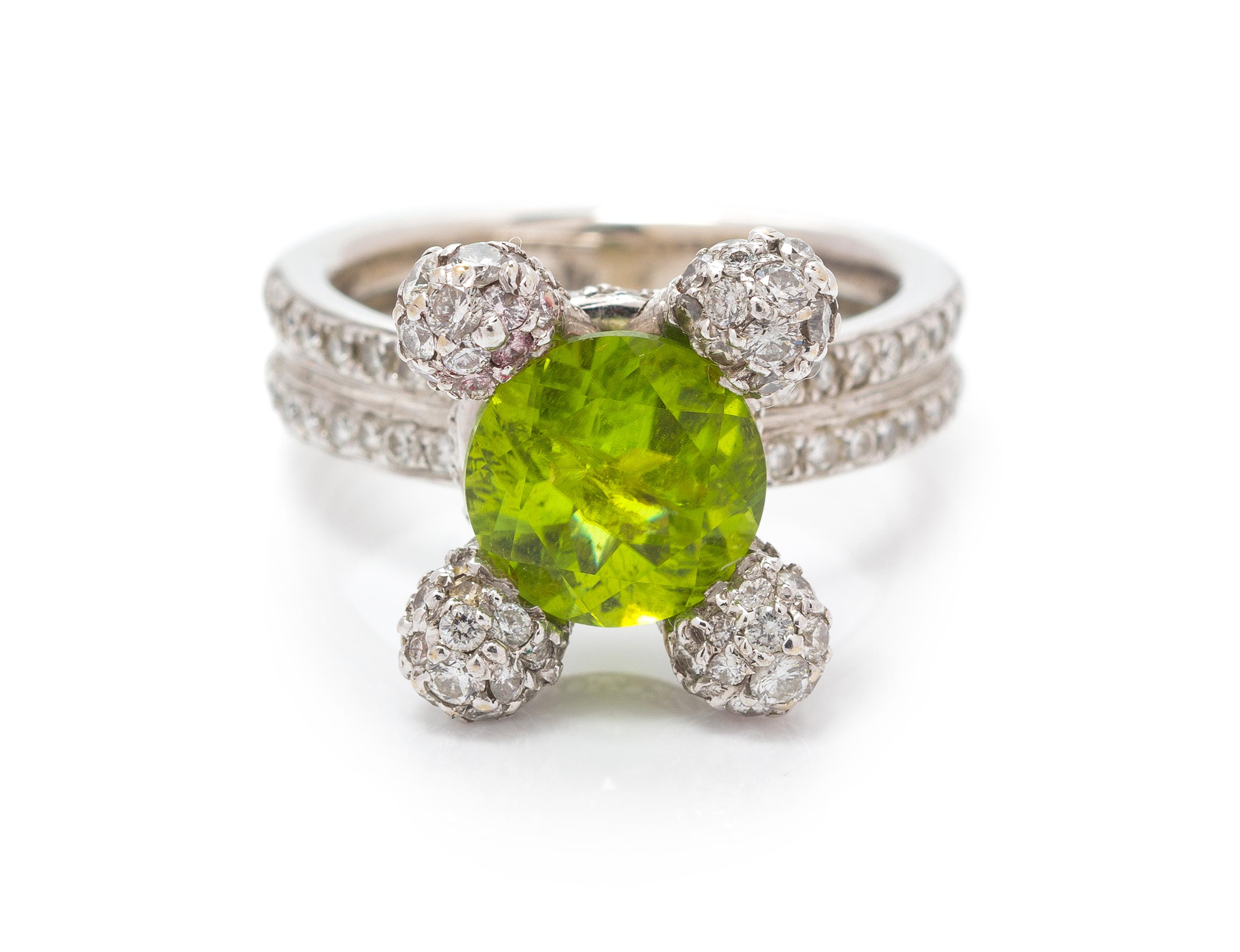 A White Gold, Peridot and Diamond Ring, 10.60 dwts.