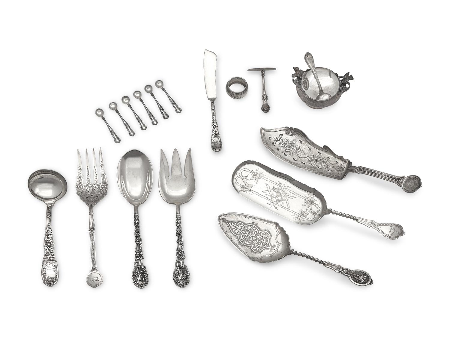 An Assembled Group of Eighteen Sterling Silver and Silver Serving Pieces, Various Makers, Late 19th / Early 20th Century